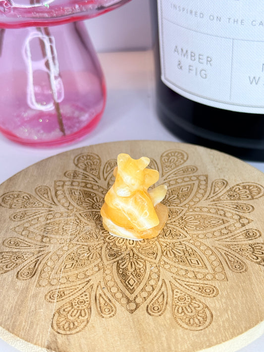 Orange Calcite Dragonite-Inspired Carving