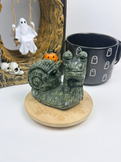 Serpentine Skull Snail Statue
