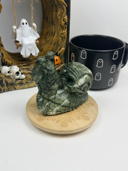 Serpentine Skull Snail Statue