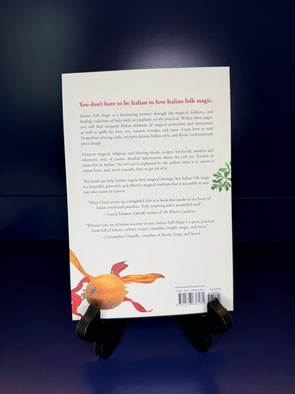 White book back cover with text and an orange illustration on a dark background