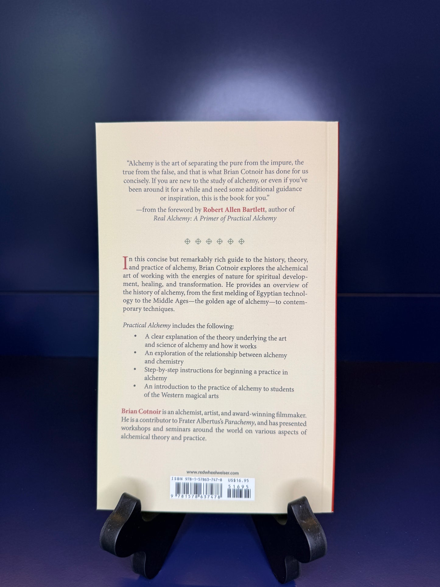 Book on a stand with a blue gradient background