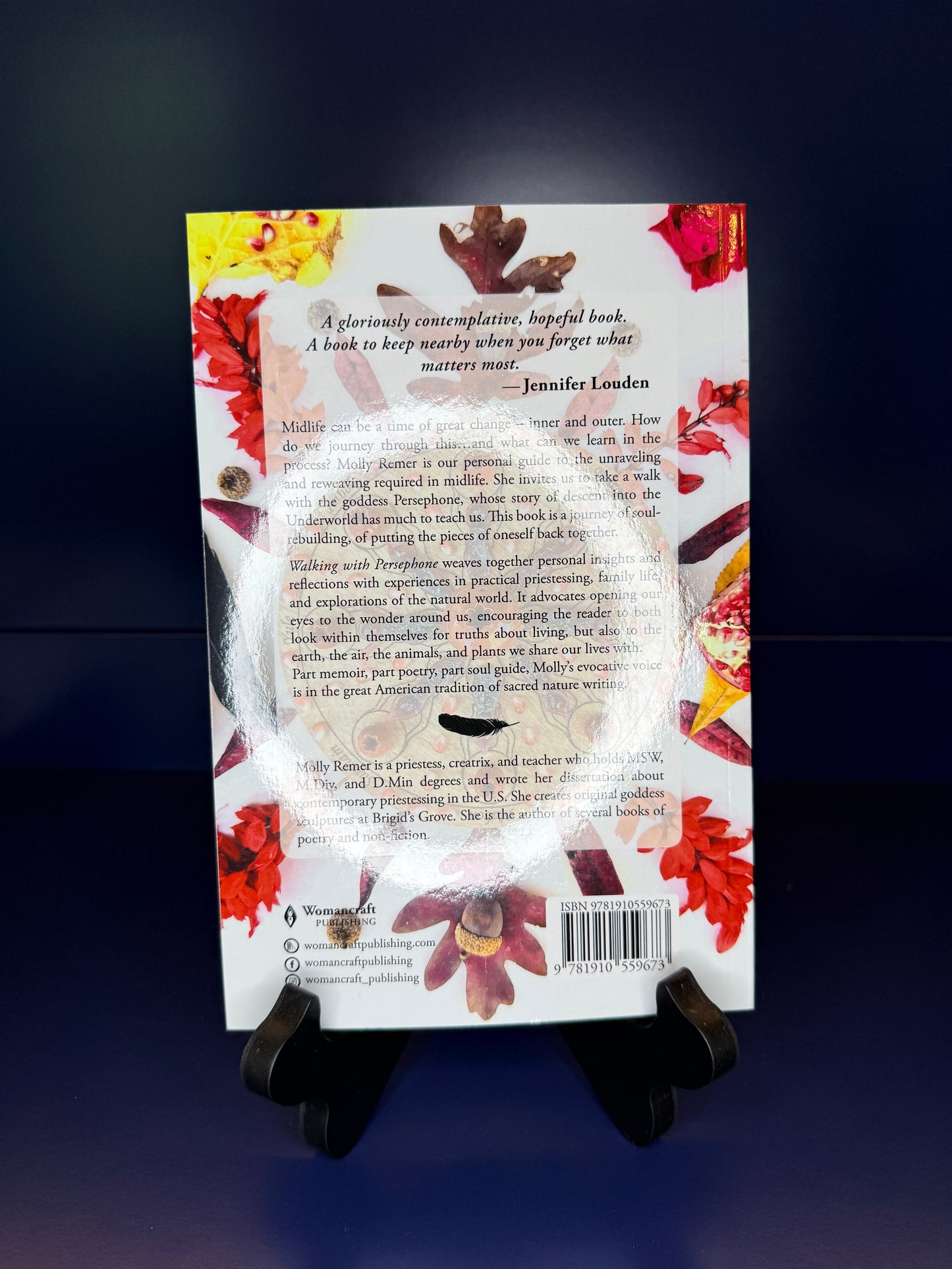 Book cover with floral design and text on a dark background