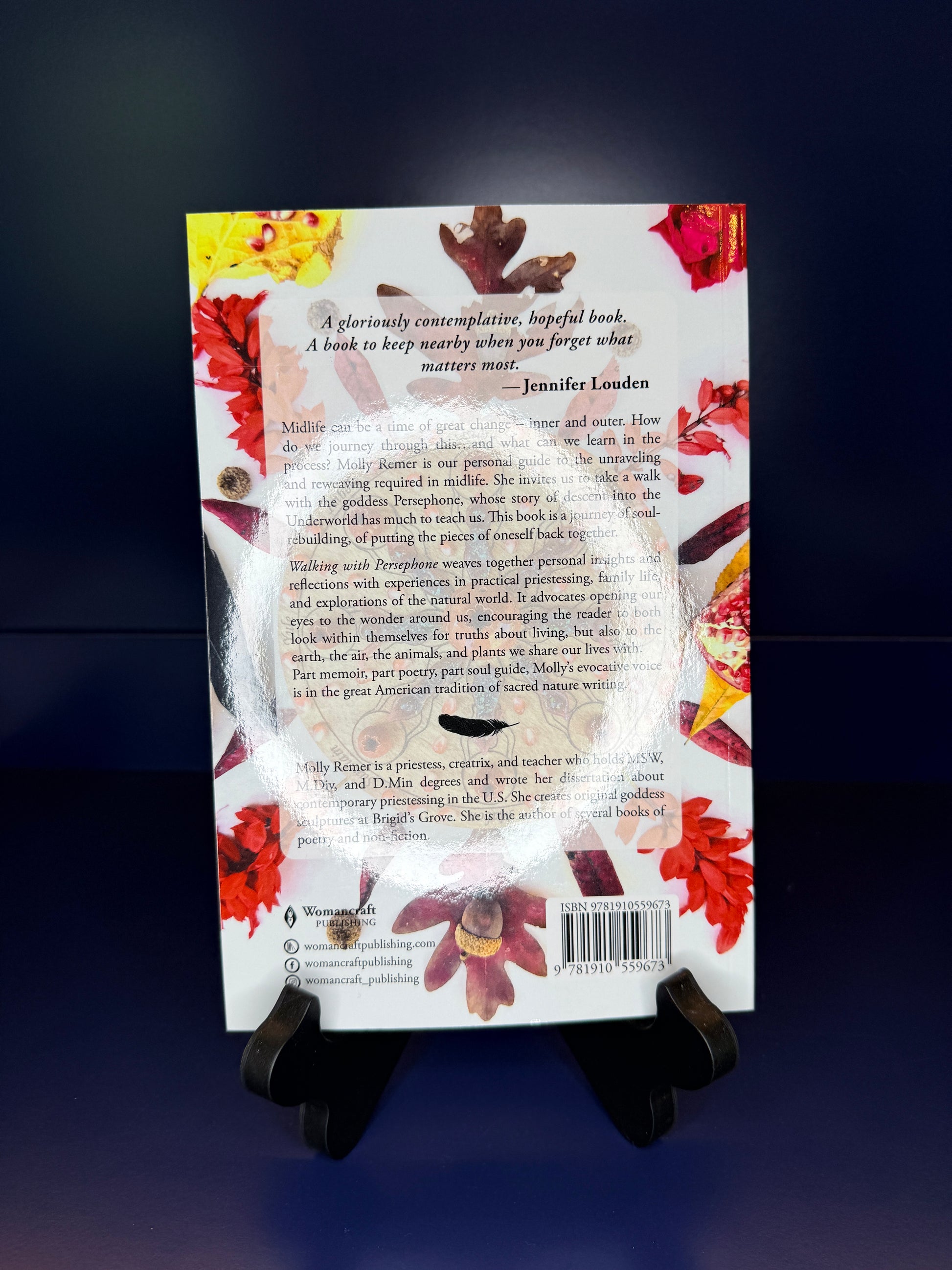 Book cover with floral design and text on a dark background