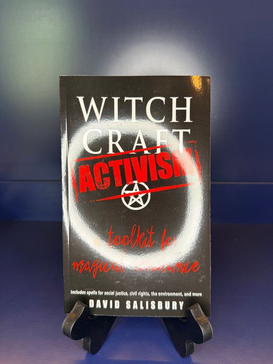 Book titled 'Witchcraft Activism' on a dark background